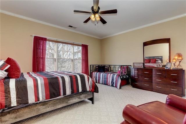 carpeted bedroom with crown molding and ceiling fan