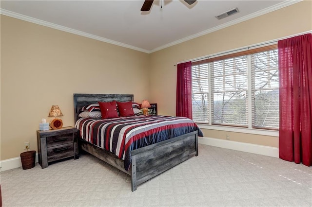 bedroom featuring ceiling fan, carpet flooring, and ornamental molding