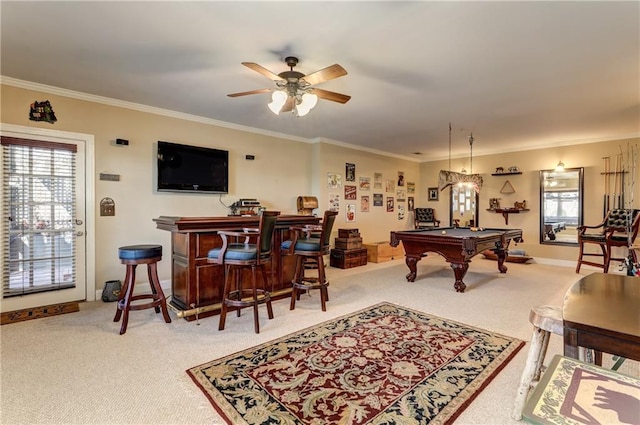 recreation room with pool table, ceiling fan, bar, carpet flooring, and ornamental molding