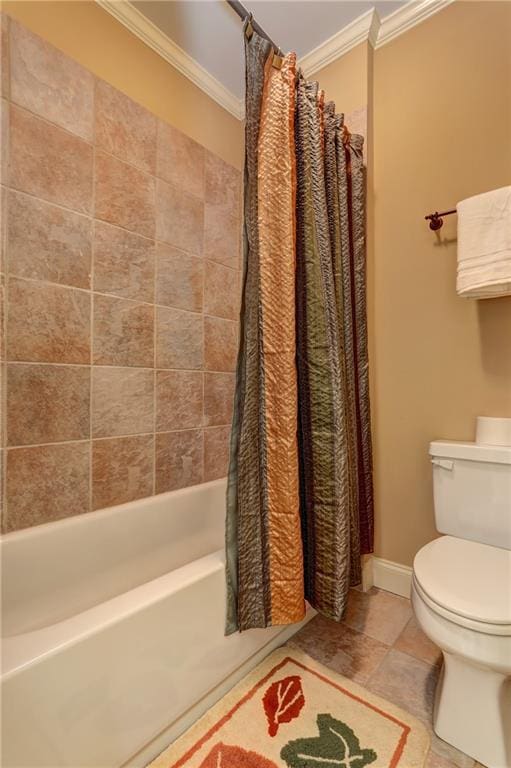 bathroom with toilet, ornamental molding, and shower / tub combo