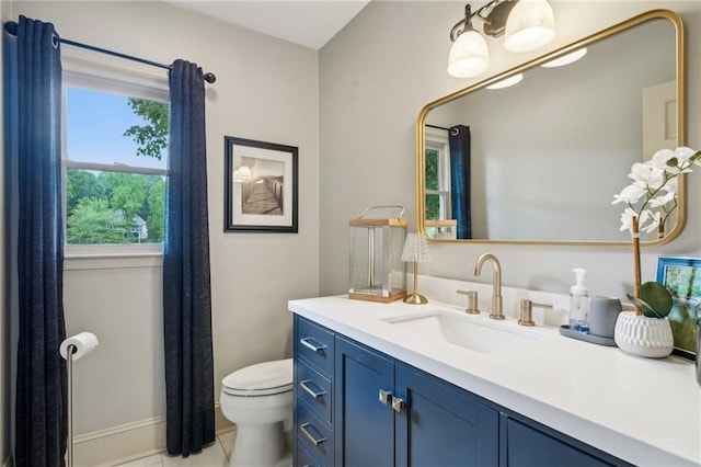 177 Coopers Pond Dr, Lawrenceville, GA 30044 - bathroom featuring vanity, toilet, tile patterned floors, and baseboards
