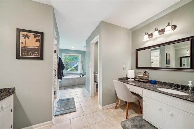 177 Coopers Pond Dr, Lawrenceville, GA 30044 - full bathroom featuring vanity, tile patterned floors, baseboards, a bath, and toilet