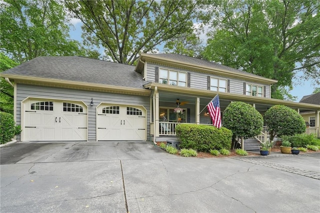 177 Coopers Pond Dr, Lawrenceville, GA 30044 - view of front of home with a porch, a garage, and driveway