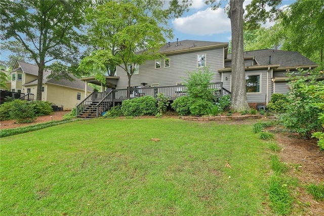 177 Coopers Pond Dr, Lawrenceville, GA 30044 - back of property featuring stairway, a deck, and a yard