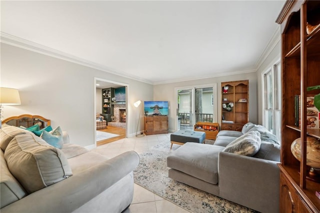 177 Coopers Pond Dr, Lawrenceville, GA 30044 - living area featuring light tile patterned floors, ornamental molding, baseboards, and a warm lit fireplace