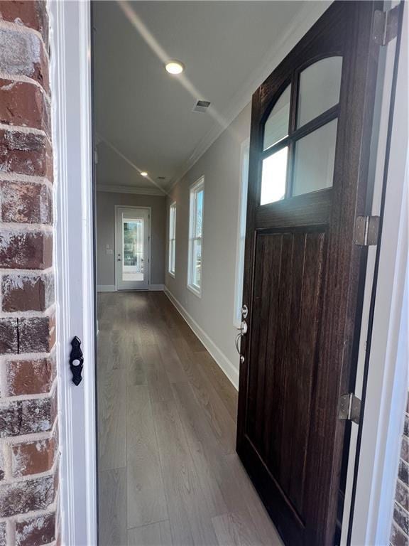 entrance to property featuring visible vents
