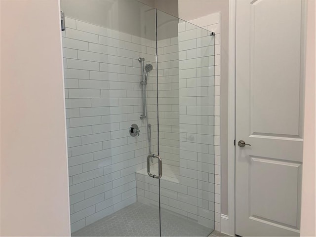 bathroom with a stall shower