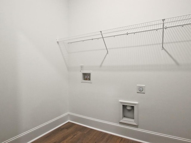 clothes washing area with laundry area, hookup for a washing machine, baseboards, dark wood-type flooring, and hookup for an electric dryer