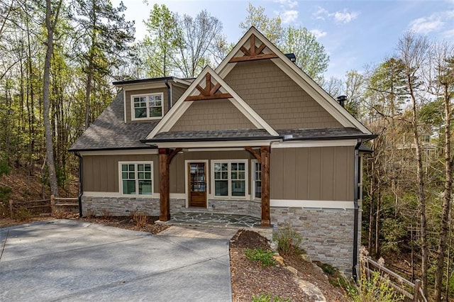 craftsman-style home with covered porch