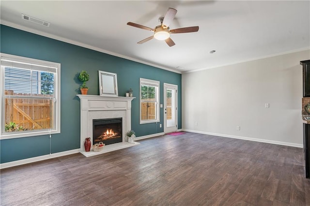unfurnished living room with ceiling fan, baseboards, dark wood-style floors, and visible vents