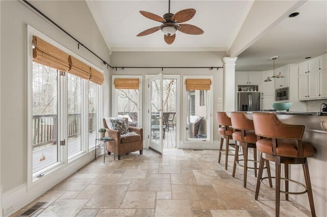 wooden terrace featuring outdoor dining area and outdoor lounge area