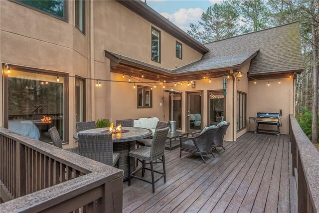 deck featuring outdoor dining space