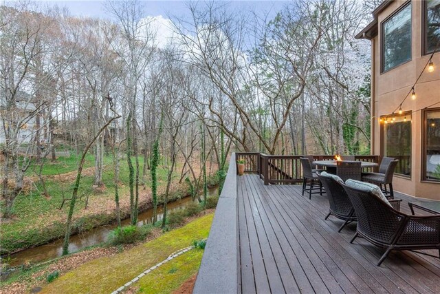 water view featuring a forest view