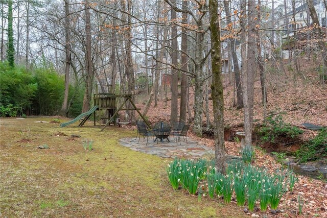view of yard featuring a playground