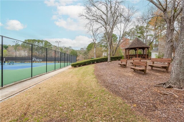 exterior space with fence and a fenced in pool
