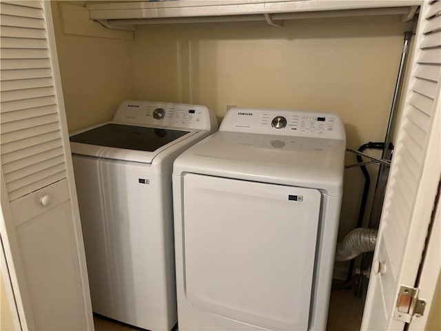 6851 Roswell Rd Unit 15, Atlanta, GA 30328 - washroom featuring washer and clothes dryer