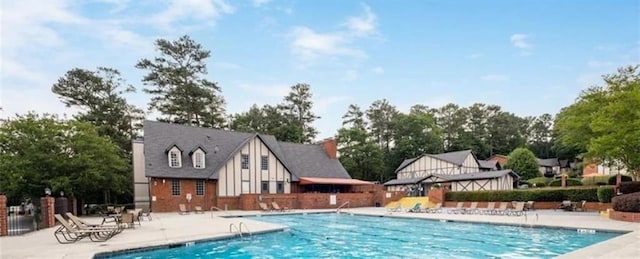 6851 Roswell Rd Unit 15, Atlanta, GA 30328 - community pool featuring a patio area