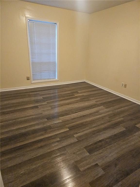 6851 Roswell Rd Unit 15, Atlanta, GA 30328 - empty room featuring baseboards and dark wood finished floors