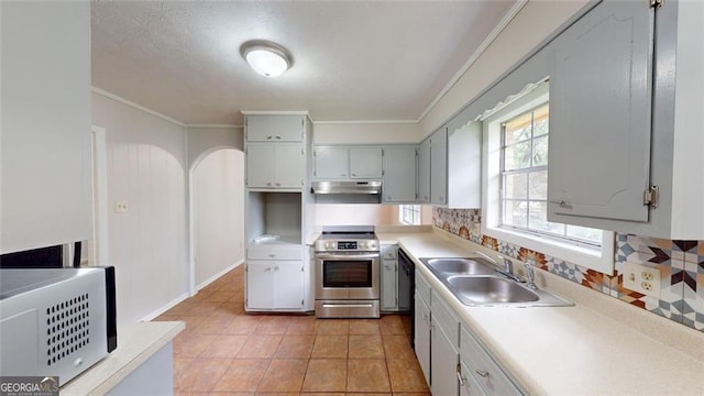 kitchen with light countertops, a sink, stainless steel range with electric stovetop, and under cabinet range hood