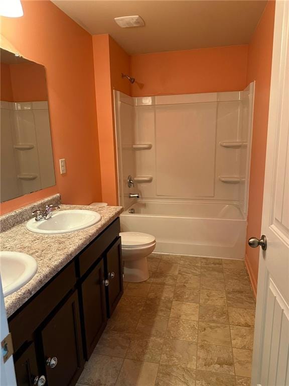 full bathroom with vanity, toilet, and shower / bathtub combination