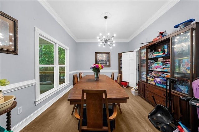 9035 Walnut Cove Ct, Gainesville, GA 30506 - dining space featuring wood finished floors, ornamental molding, a chandelier, and baseboards