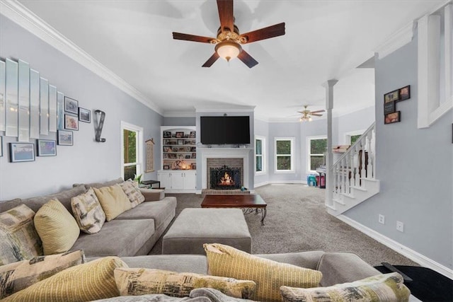 9035 Walnut Cove Ct, Gainesville, GA 30506 - living room with ceiling fan, carpet, a fireplace, stairs, and crown molding