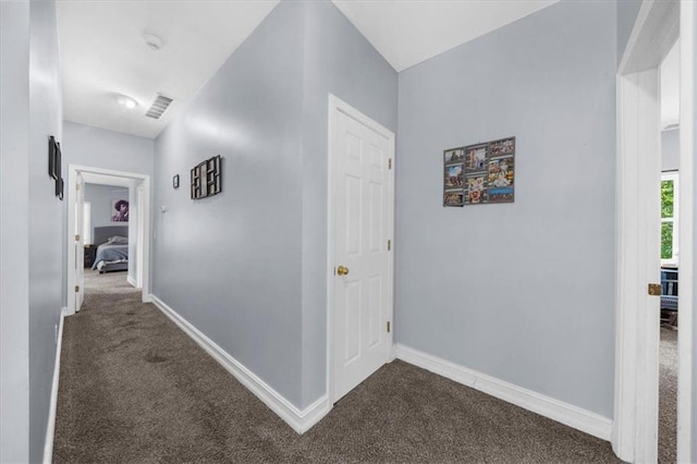 9035 Walnut Cove Ct, Gainesville, GA 30506 - hallway featuring dark colored carpet and baseboards