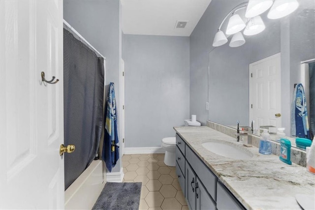 9035 Walnut Cove Ct, Gainesville, GA 30506 - full bath with tile patterned floors, vanity, toilet, and shower / bath combo