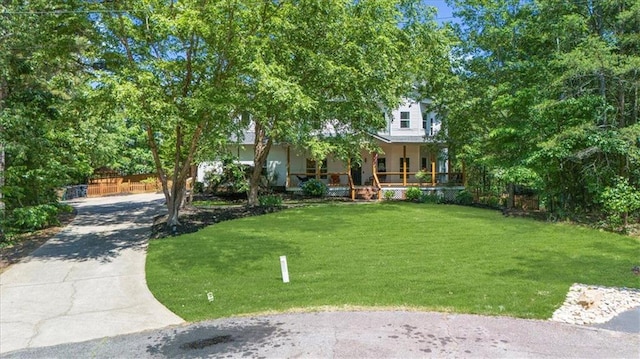 9035 Walnut Cove Ct, Gainesville, GA 30506 - view of front of home with a porch, a front yard, and concrete driveway