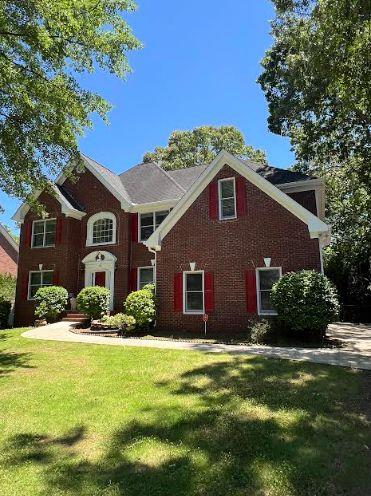 5190 Beech Forest Dr SW, Lilburn, GA 30047 - view of front of property with a front yard