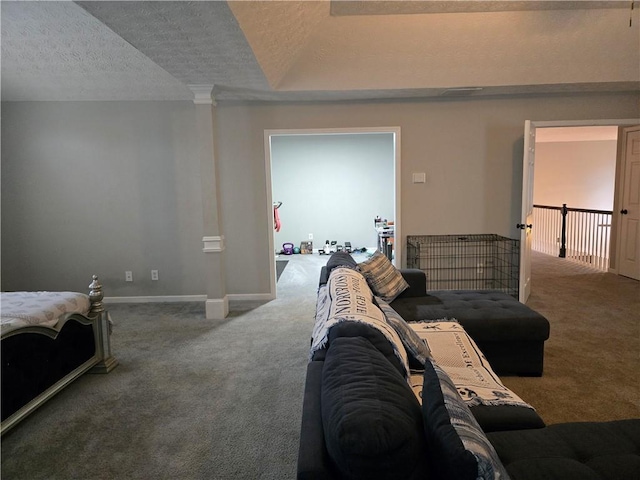 living area with a textured ceiling, baseboards, and carpet flooring