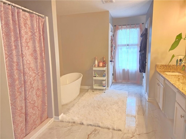 full bath with marble finish floor, baseboards, curtained shower, and vanity