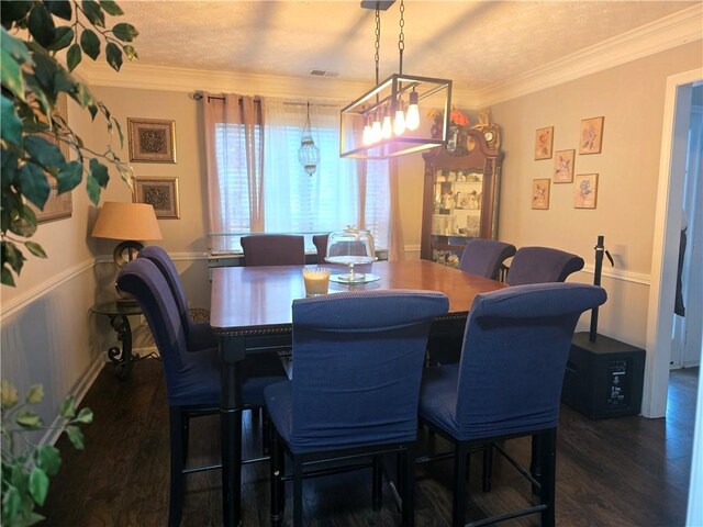 living room with carpet, a textured ceiling, and ornamental molding