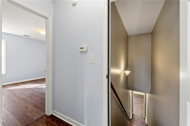 hallway featuring dark hardwood / wood-style floors