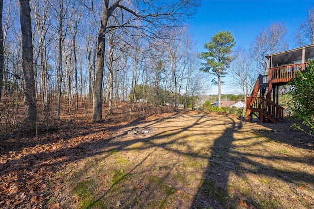 view of yard featuring a wooden deck