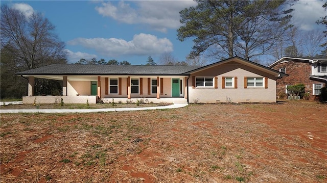 ranch-style home with a porch, brick siding, and crawl space