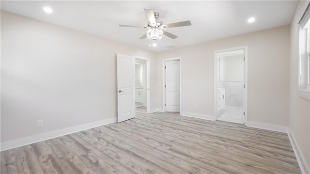 unfurnished bedroom with connected bathroom, baseboards, light wood-type flooring, recessed lighting, and a ceiling fan