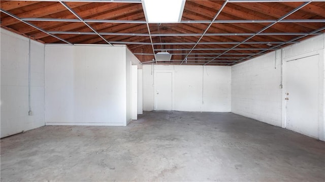 basement featuring concrete block wall