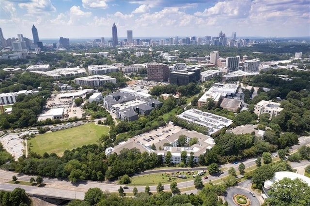 birds eye view of property with a city view