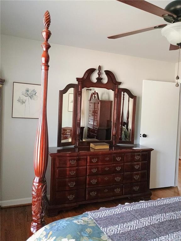 bedroom with wood finished floors