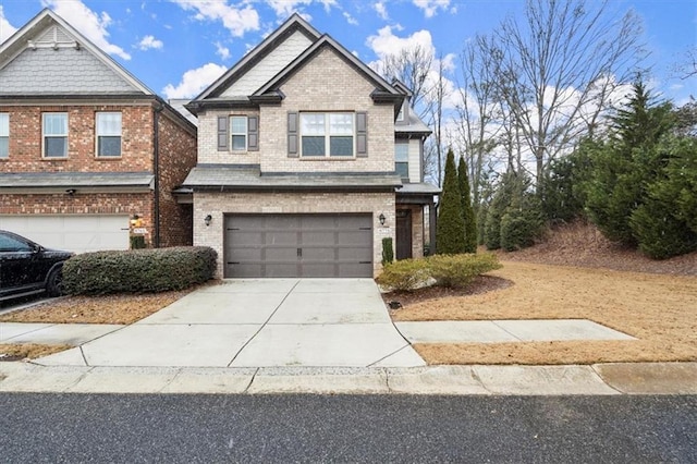 view of front of property with a garage