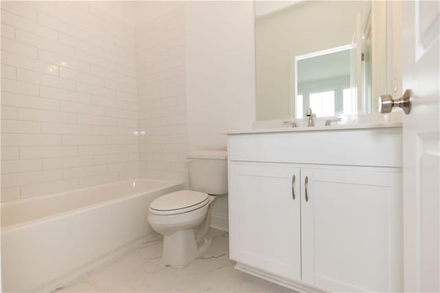 full bathroom featuring vanity, tiled shower / bath, and toilet