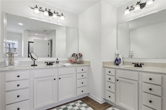 bathroom featuring vanity and tile patterned flooring