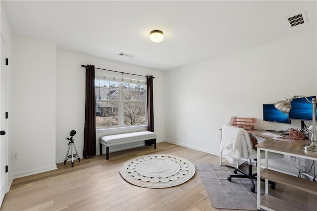 office area with light wood-type flooring