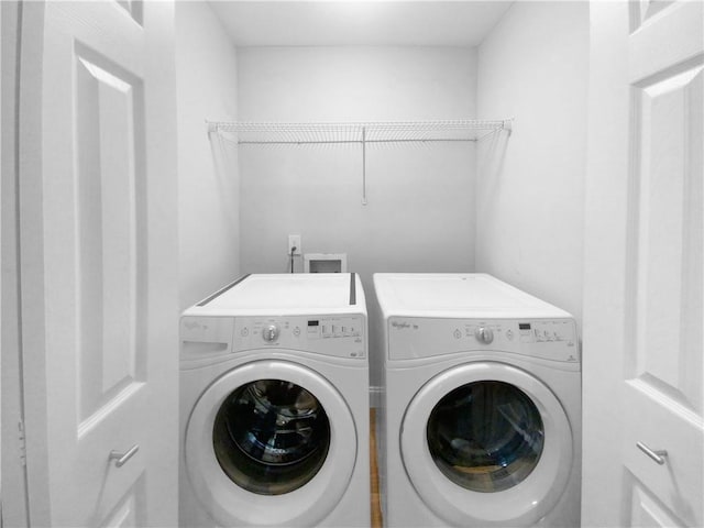 laundry area featuring independent washer and dryer