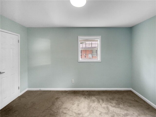 empty room featuring carpet floors