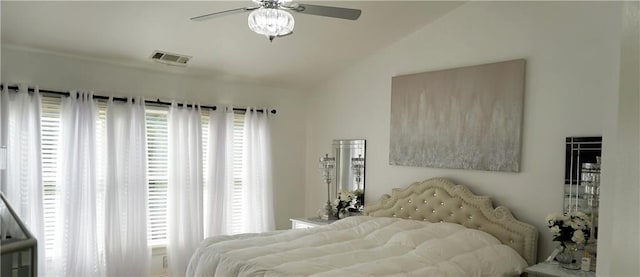 bedroom featuring lofted ceiling and ceiling fan