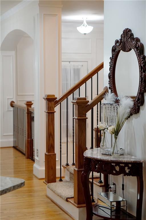 hallway with light hardwood / wood-style flooring