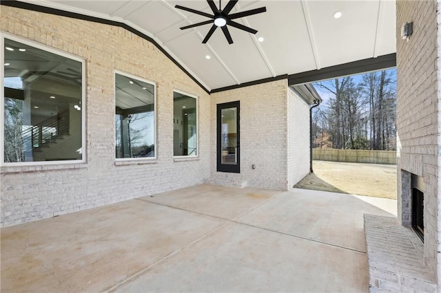 view of patio featuring ceiling fan