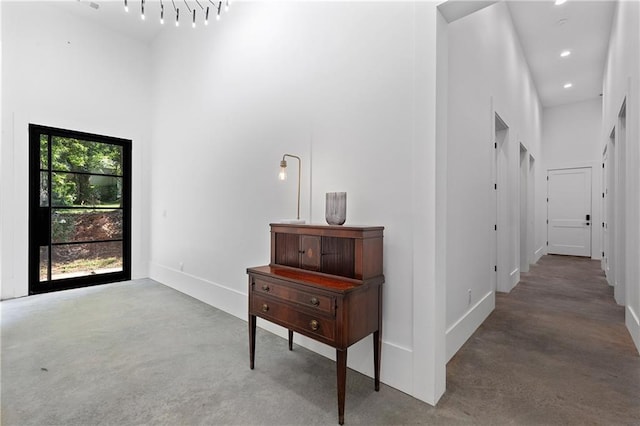 538 Main St, Palmetto, GA 30268 - corridor with a high ceiling, finished concrete flooring, and recessed lighting